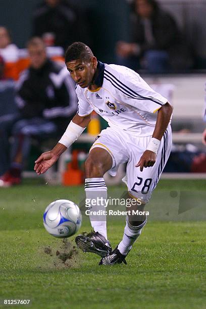 Defender Sean Franklin of the Los Angeles Galaxy kicks the ball up the field against the Colorado Rapids during their U.S. Open Cup play-in game at...