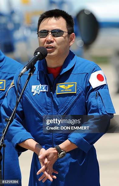 Japanese astronaut Akihiko Hoshide talks with reporters upon the arrival of the crew of US space shuttle Discovery at Kennedy Space Center on May 28,...
