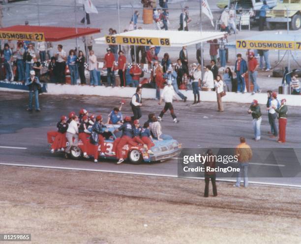 Richard Petty driver of the STP Oldsmobile drives to victory lane after winning the Winston Cup Daytona 500 on February 18, 1979 at the Daytona...