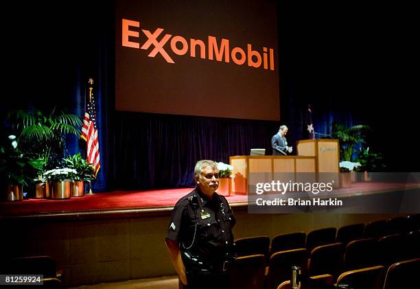 Police officer stands guard after the ExxonMobil annual shareholders meeting at the Morton H. Meyerson Symphony Center May 28, 2008 in Dallas, Texas....