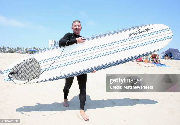 Manchester United legend Bryan Robson takes part in a surfing lesson as part of their pre-season tour of the United States of America at Muscle Beach...