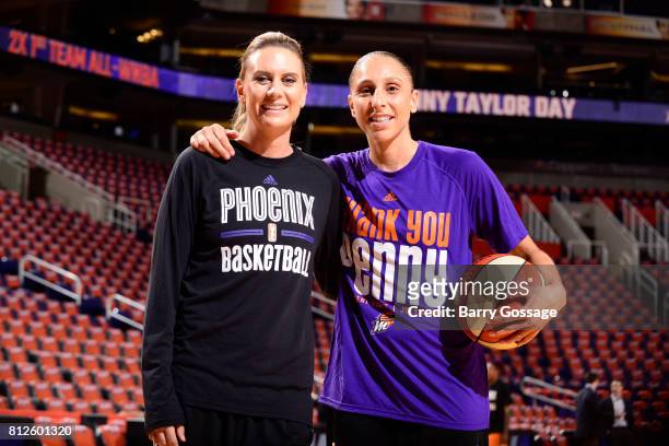 Former WNBA player, Penny Taylor and Diana Taurasi of the Phoenix Mercury pose for a photo before the game against the New York Liberty on July 9,...