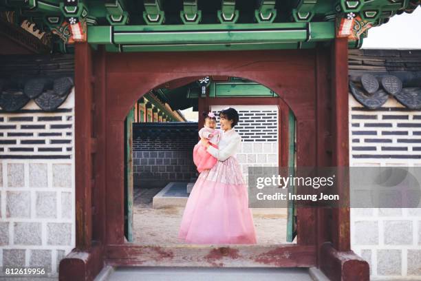 mother having fun with her baby - korea landmark stock pictures, royalty-free photos & images