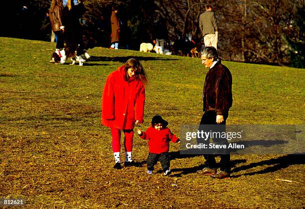 Caroline Kennedy Schlossberg and her husband, Edwin, and daughter, Rose, stoll along Central Park in New York City, January 27, 1990.