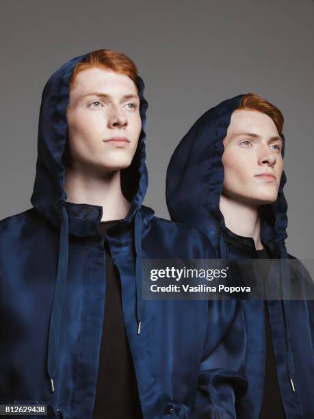 portrait of twins - same person different looks - fotografias e filmes do acervo