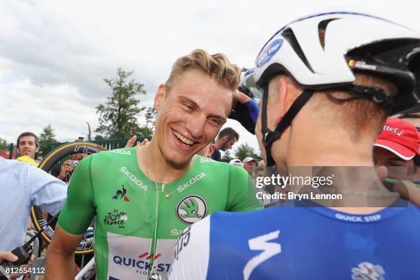 Marcel Kittel of Germany riding for Quick-Step Floors celebrates with his team mate Julien Vermote of Belgium riding for Quick-Step Floors after...