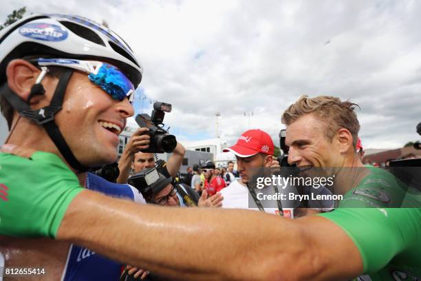 Marcel Kittel of Germany riding for Quick-Step Floors celebrates with his team mate Julien Vermote of Belgium riding for Quick-Step Floors after...