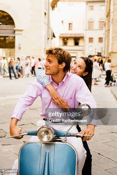 sightseeing couple on scooter - man with scooter bildbanksfoton och bilder