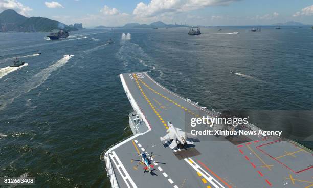July 11, 2017 -- China's first aircraft carrier, the Liaoning, leaves after wrapping up a five-day visit to the Hong Kong Special Administrative...