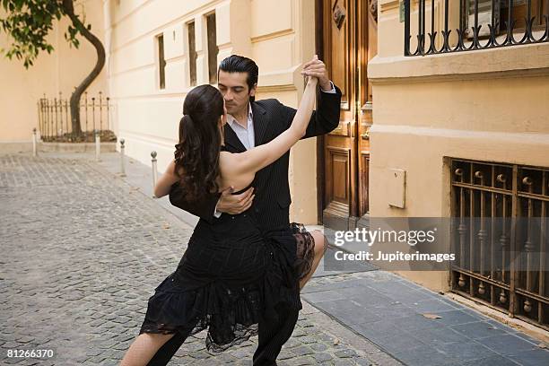 couple dancing - tango black stock-fotos und bilder