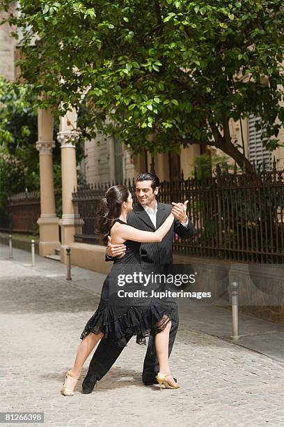 couple dancing - tango black stock-fotos und bilder