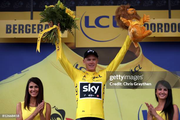 Christopher Froome of Great Britain riding for Team Sky poses for a photo on the podium in the leader's jersey after stage 10 of the 2017 Le Tour de...