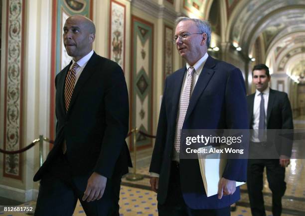 Sen. Cory Booker walks with Executive Chairman of Alphabet Inc. Eric Schmidt at the Capitol July 11, 2017 in Washington, DC.