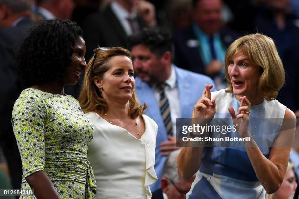 Denise Lewis and Darcey Bussell look on as Fiona Bruce crosses her fingers in the centre court royal box during the Ladies Singles quarter final...