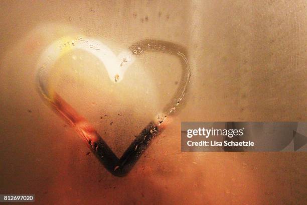 heart painted on bathroom mirror - hot shower stock pictures, royalty-free photos & images