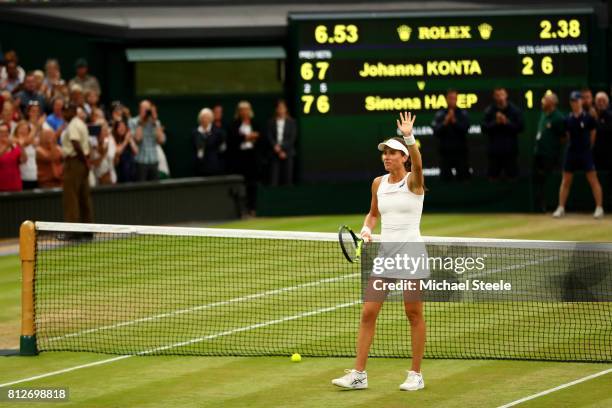 Johanna Konta of Great Britain celebrates victory after the Ladies Singles quarter final match against Simona Halep of Romania on day eight of the...