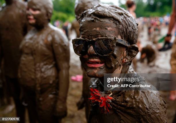 Glander of Westland, Michigan waits for the Mud Day King judging during Wayne County's annual Mud Day at Nankin Mills Park on July 11, 2017 in...