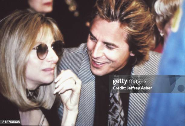 Singer Barbra Streisand and Actor Don Johnson ringside at Tyson vs Holmes Convention Hall in Atlantic City, New Jersey January 22 1988.