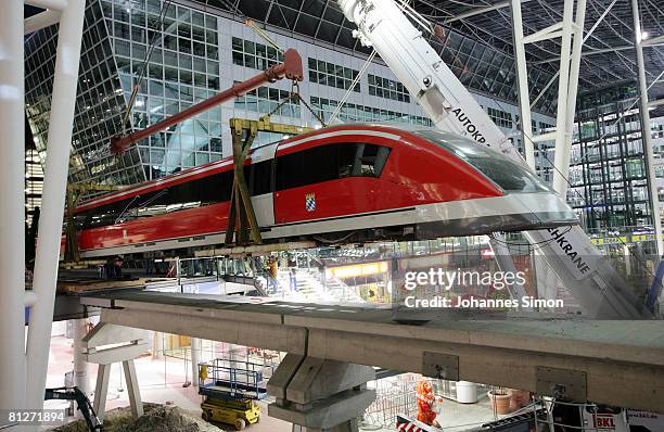 Model of the Transrapid magnetic levitation train is taken down from display at the Munich Airport on May 28, 2008 in Munich, Germany. Officials of...