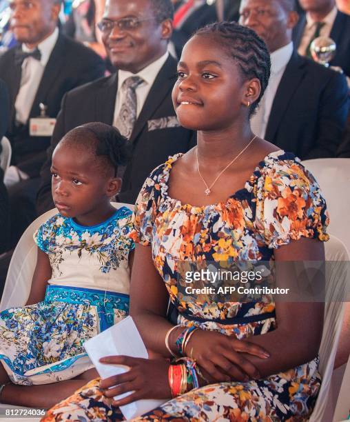 Madonna's adopted Malawian daughter, Mercy James , one of her newly adopted children, attend the opening ceremony of the Mercy James Children's...