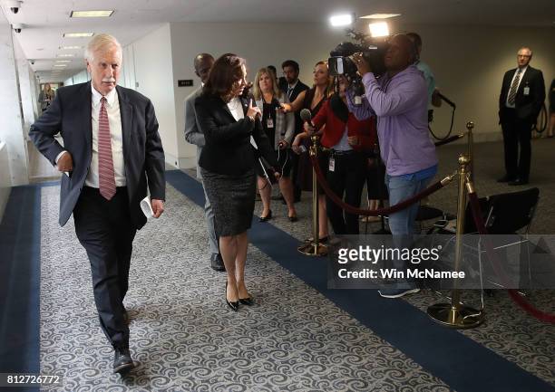 Sen. Angus King and Sen. Kamala Harris arrive for a closed committee meeting July 11, 2017 in Washington, DC. Ranking member of the committee, Sen....