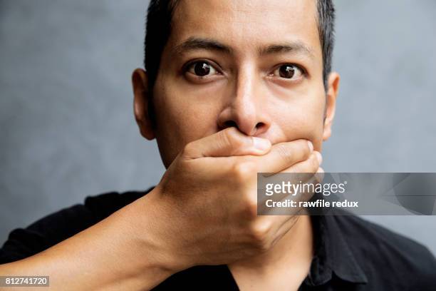 censored - hands covering mouth stockfoto's en -beelden