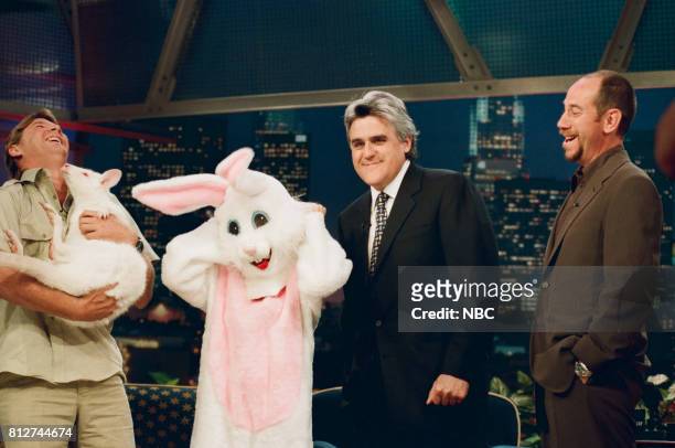 Pictured: Animal specialist Steve Irwin, actress Patricia Arquette, host Jay Leno, and actor Miguel Ferrer pose for a photo on April 9, 1998 --