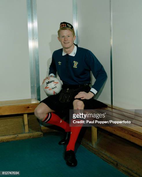 Manchester City and Scotland footballer Colin Hendry wearing a kilt at Maine Road in Manchester, circa 1990.