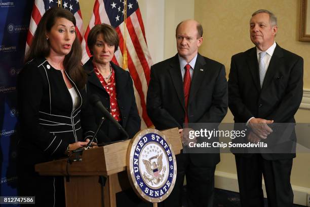 Kentucky State Secretary Alison Grimes, Sen. Amy Klobuchar , Sen. Chris Coons and Senate Minority Whip Richard Durbin hold a news conference about...