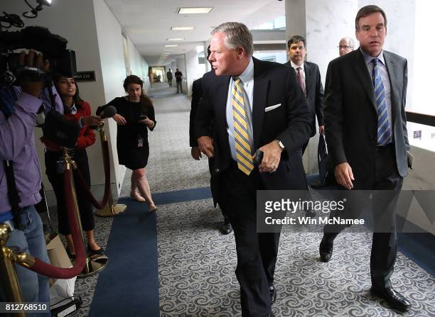 Sen. Richard Burr , chairman of the Senate Select Committee on Intelligence, and Sen. Mark Warner , ranking member of the committee, depart a closed...