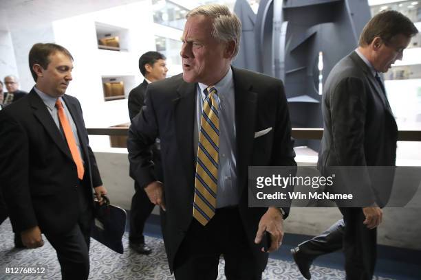 Sen. Richard Burr , chairman of the Senate Select Committee on Intelligence, and Sen. Mark Warner , ranking member of the committee, depart a closed...