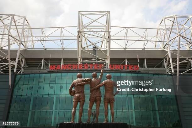 The statue of Manchester United's 'Holy Trinity' of players stands in front of Old Trafford after being unveiled today on May 29 Manchester, England....