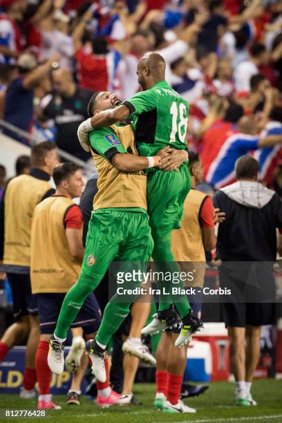 Goalkeeper Patrick Pemberton of Costa Rica goes over to the sidelines to celebrate the goal during the Group A CONCACAF Gold Cup Match between...