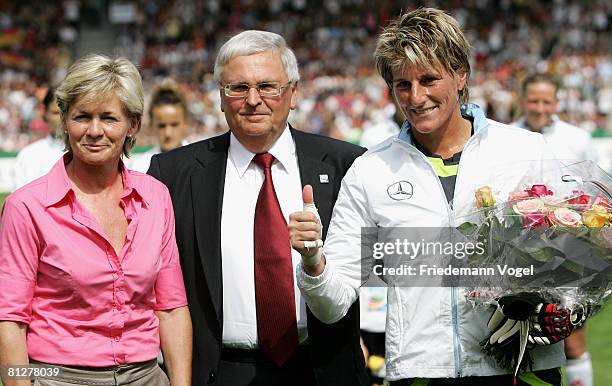 Theo Zwanziger, president of the German Football Association , Goalkeeper Silke Rottenberg and Head coach Silvia Neid of Germany looks on before the...