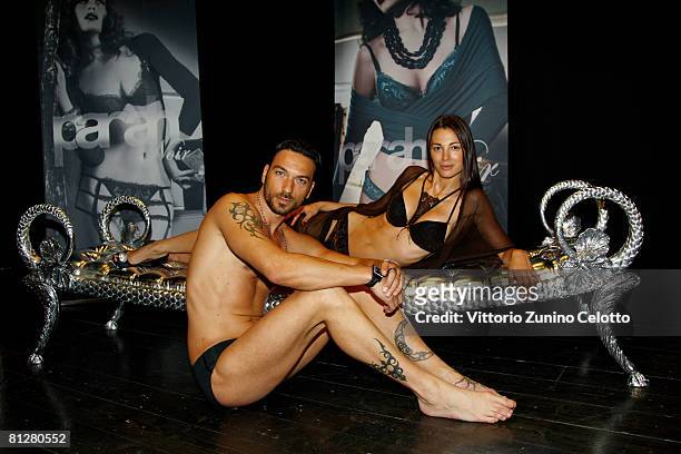 Actor and model Costantino Vitagliano and his girlfriend, model Linda Santaguida showcase designs from the Parah Noir Autumn/Winter 2008-09 new mens...