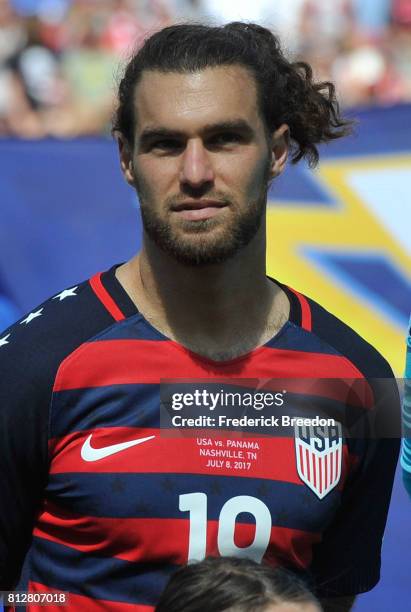 Graham Zusi of USA stands for the anthem prior to a CONCACAF Gold Cup Soccer match against Panama at Nissan Stadium on July 8, 2017 in Nashville,...