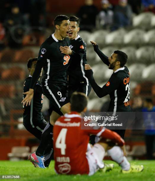 Oscar Cardozo of Libertad celebrates with teammates Jesus Medina, Angel Cardozo Lucena and Antonio Bareiro after scoring the opening goal of his team...