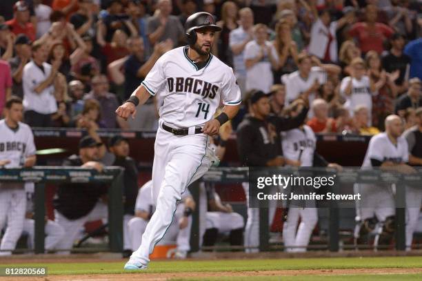 Reymond Fuentes of the Arizona Diamondbacks rounds third base in the eighth inning of the MLB game against the Philadelphia Phillies at Chase Field...