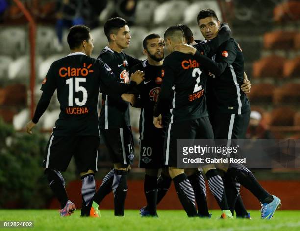 Oscar Cardozo of Libertad celebrates with teammates Jesus Medina, Angel Cardozo Lucena, Antonio Bareiro and Alan Benitez after scoring the opening...