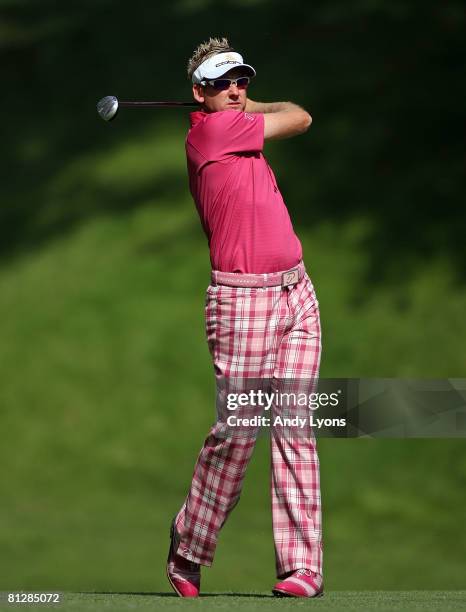 Ian Poulter of England hits his second shot on the 15th hole during the first round of the Memorial Tournament at Muirfield Village Golf Club May 29,...