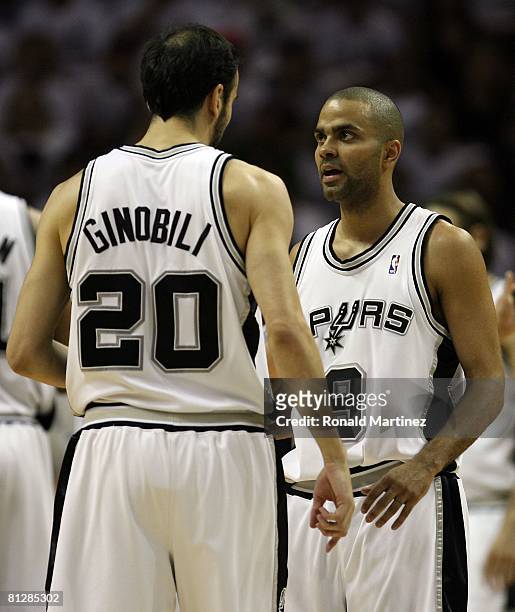 Tony Parker and Manu Ginobili of the San Antonio Spurs talk while taking on the Los Angeles Lakers in Game Four of the Western Conference Finals...