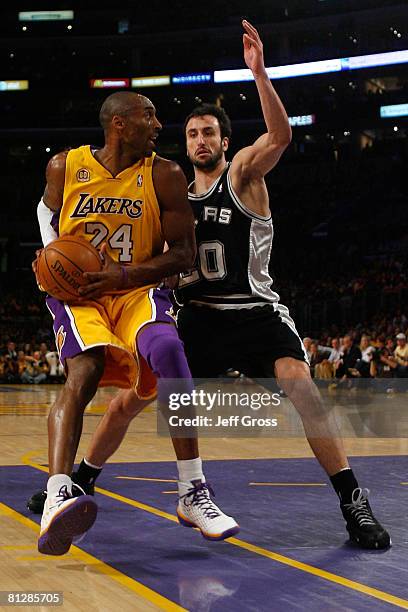 Kobe Bryant of the Los Angeles Lakers drives on Manu Ginobili of the San Antonio Spurs in the first quarter of Game Five of the Western Conference...