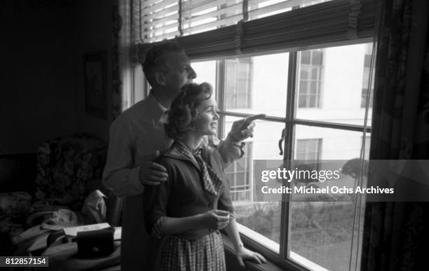 Actress Debbie Reynolds and Gene Kelly about to shoot "Singin' in the Rain" in 1951 in Los Angeles, California.