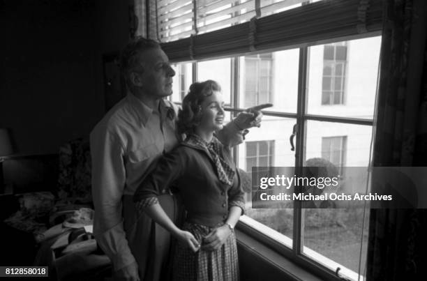 Actress Debbie Reynolds and Gene Kelly about to shoot "Singin' in the Rain" in 1951 in Los Angeles, California.