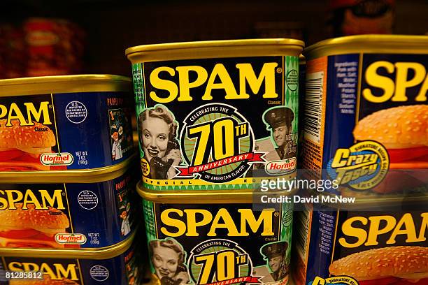 Seventieth anniversary cans of Spam, the often-maligned classic canned lunch meat made by Hormel Foods, are seen on a grocery store shelf May 29,...