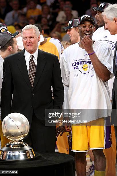 Los Angeles Lakers legend Jerry West, Kobe Bryant and general manager Mitch Kupchak of the Los Angeles Lakers smiles after defeating the San Antonio...