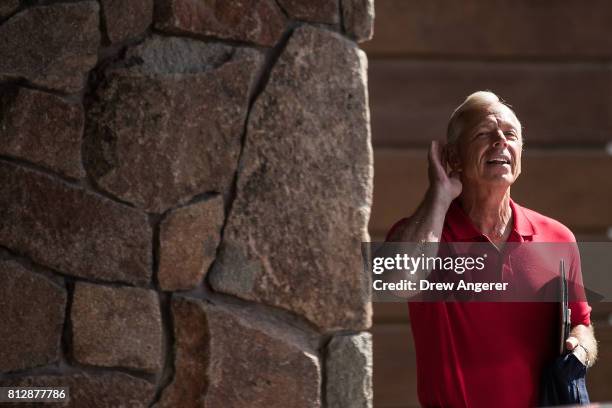 Lowell McAdam, chairman and chief executive officer of Verizon Communications, listens to a question from reporters on the first day of the annual...