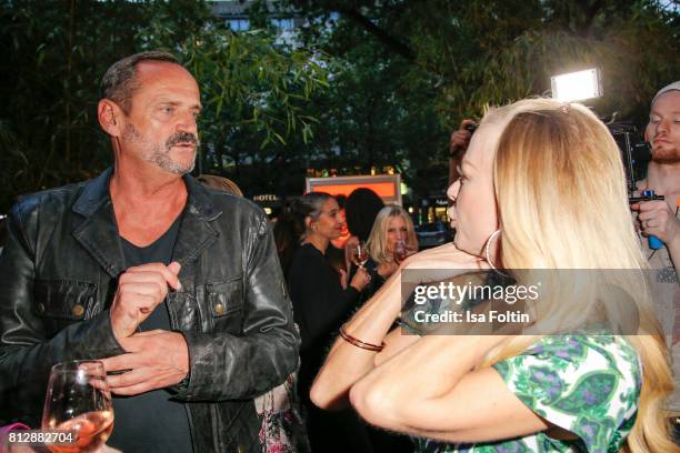 Goetz Elbertzhagen and German actress Jenny Elvers during the 'True Berlin' Hosted By Shan Rahimkhan on July 11, 2017 in Berlin, Germany.