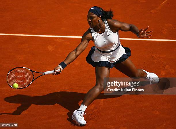 Serena Williams of USA volleys during the Women's Singles third round match against Katarin Srebotnik of Slovenia on day six of the French Open at...