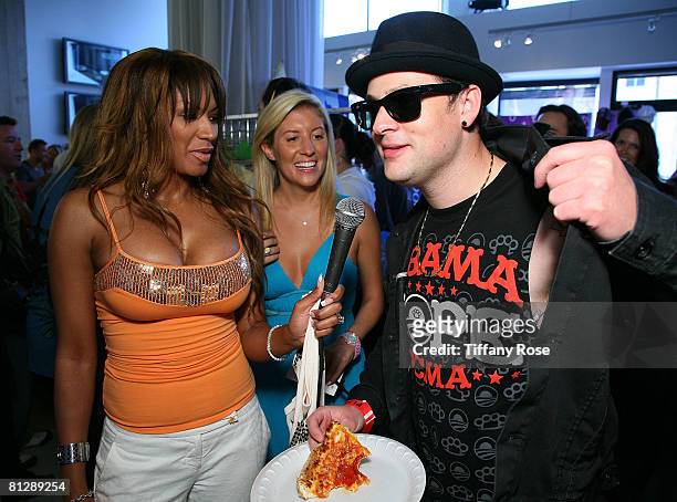 Actress Traci Bingham, Melanie Segal and Musician Joel Madden at the Melanie Segal's Hollywood Platinum Lounge for the MTV Movie Awards Day One at...